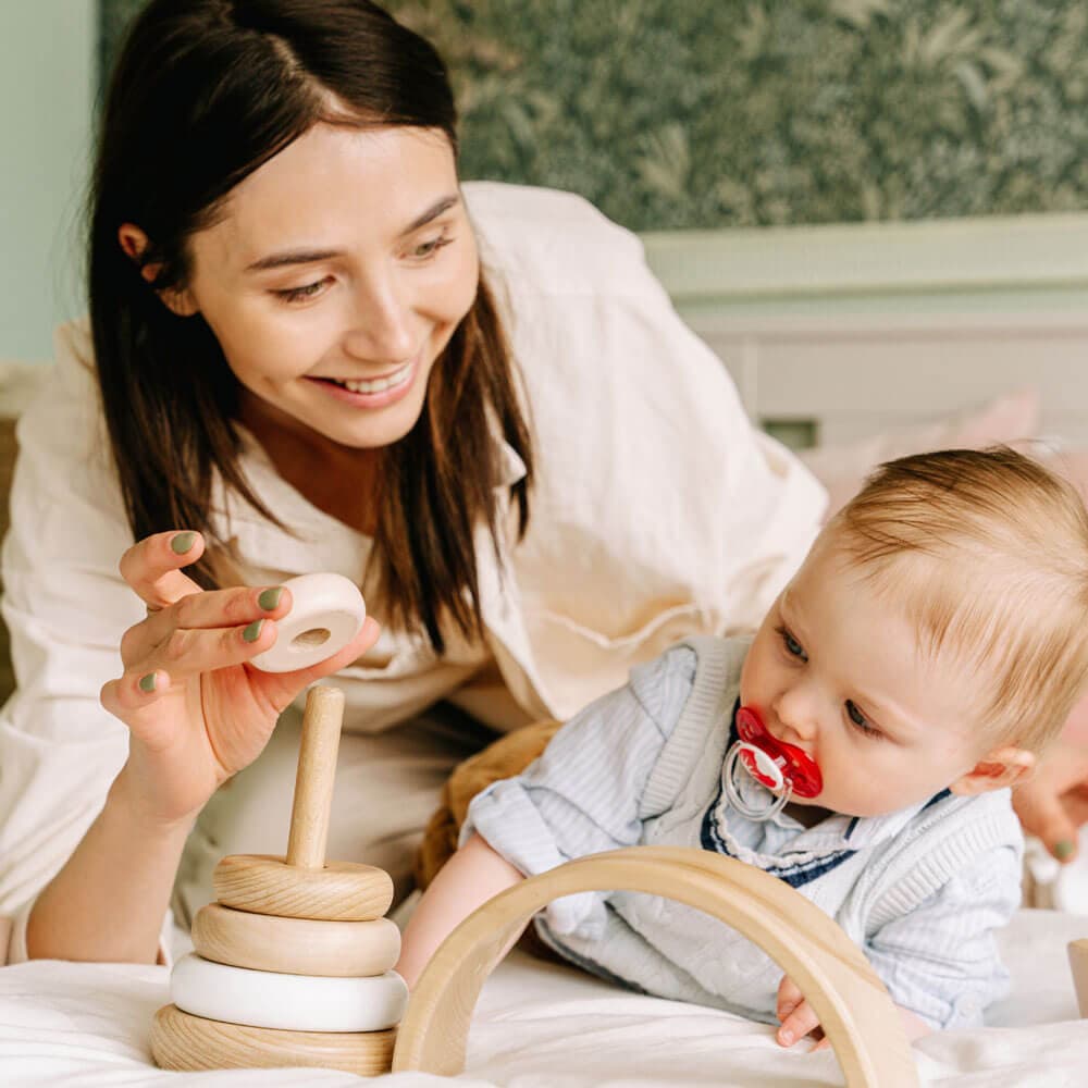 Nanny playing with baby